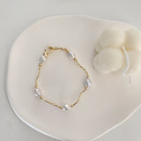 Gold Curve Baroque Pearls Bracelets